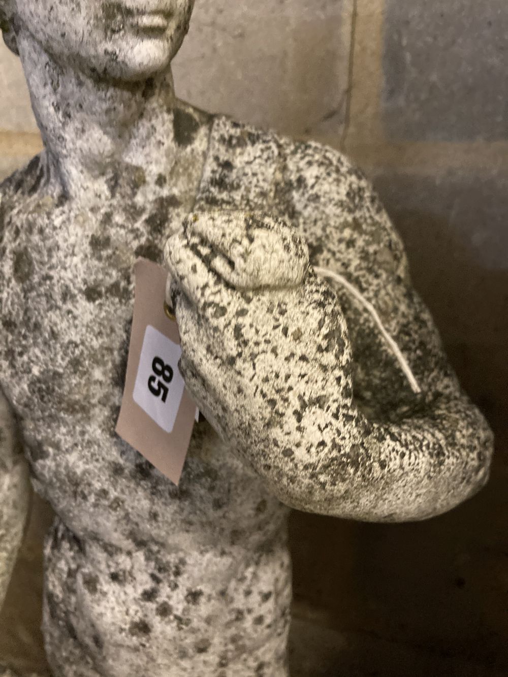 Three reconstituted stone garden ornaments, largest 83cm high